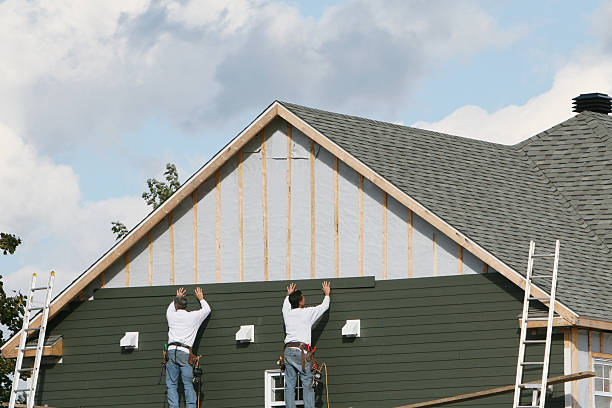 Professional Siding technician working in Parkville, PA